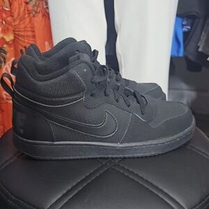 Nike All-Black Mid-Top Sneakers